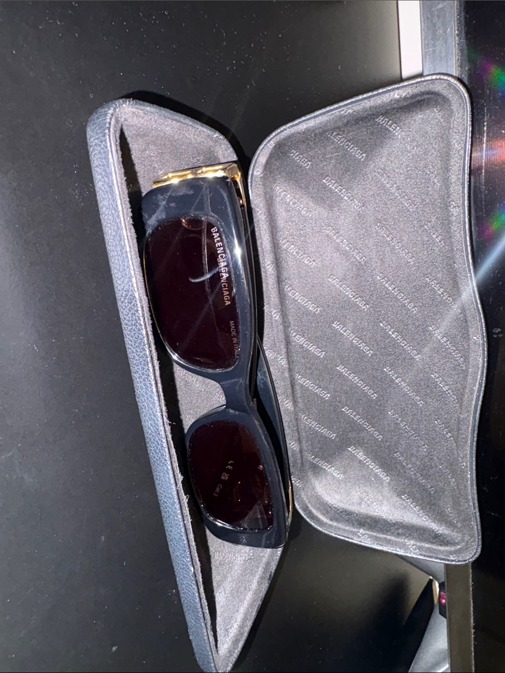 Balenciaga Black Sunglasses with Gold Accents and Branded Case
